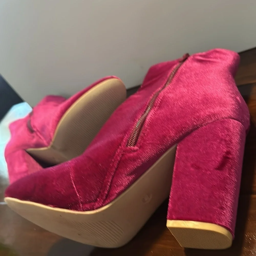 New but tried on Velvet Pink Ankle Boots. Size 9.5. Zip on side. Heel 4”.